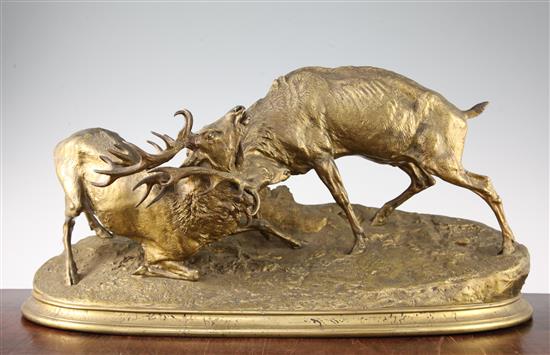 After P J Mene. A large bronze group modelled as two fighting stags, 22in.